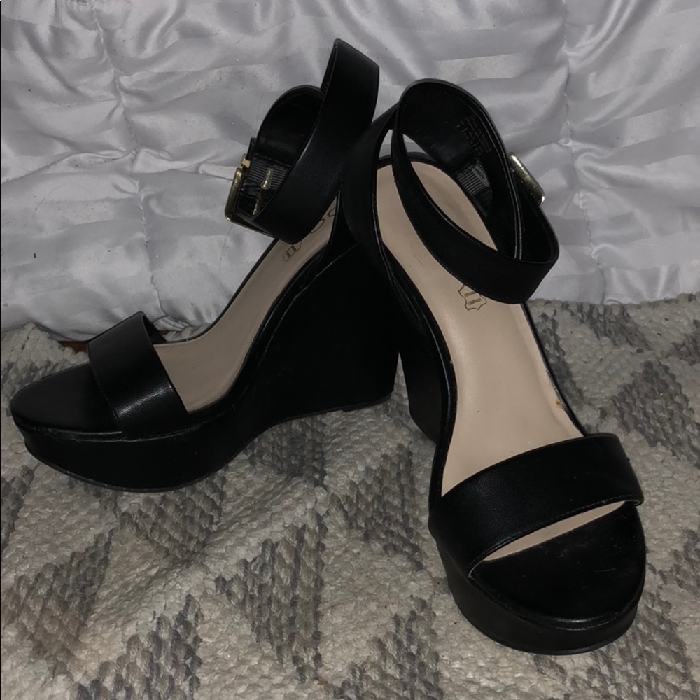 Black leather wedges